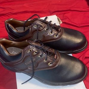 Black and brown footjoy golf shoes